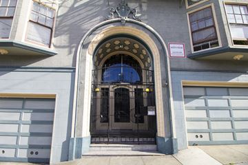 San Francisco apartment for rent - the front door of a building with a wrought iron gate