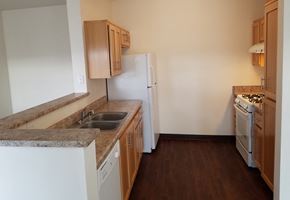 Arvin apartment for rent - Image of faucet, sink, dishwasher, stove, refrigerator, cabinets, and counter tops
