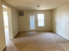 Bakersfield apartment for rent - Image of door, windows, and what looks like an entrance way