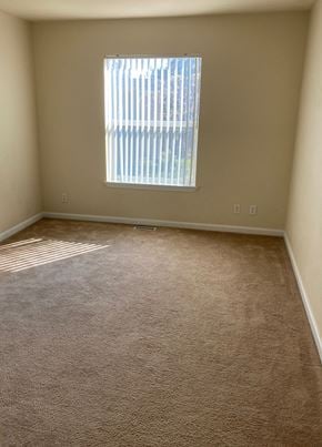 Bakersfield apartment for rent - Bedroom with window and outlets