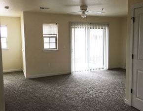 Kalispell apartment for rent - Image of living space with sliding glass doors