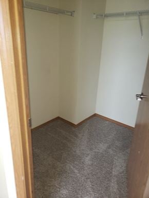 Sheridan apartment for rent - Image of large closet with hanger racks