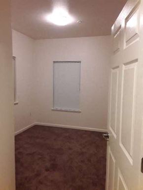 Watsonville apartment for rent - Image of bedroom with carpet and window