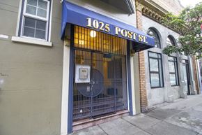 San Francisco apartment for rent - A post office with a blue awning and a sign that reads 1025 POST ST.