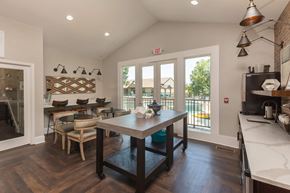 Madison apartment for rent - A kitchen with a table and chairs in the middle of the room.