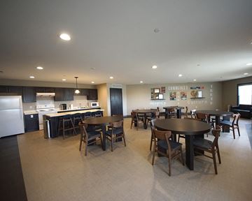Worthington apartment for rent - a large dining room and kitchen with a table and chairs