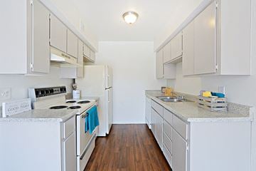 Mesa apartment for rent - a renovated kitchen with white appliances and counter tops