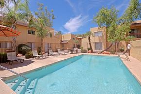 Mesa apartment for rent - our apartments have a swimming pool and a patio with chairs