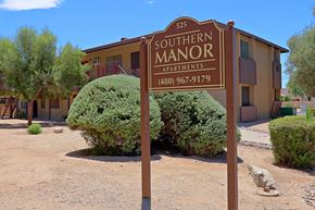 Tempe apartment for rent - a sign for southern manor apartments in front of a building