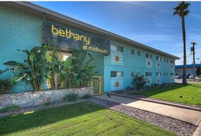 Phoenix apartment for rent - a blue building with a sign that says bethany at midtown