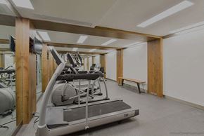 Los Angeles apartment for rent - a gym with a row of machines in it