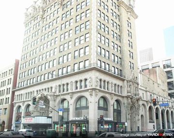 Los Angeles apartment for rent - a tall building on the corner of a city street