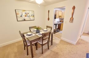 Albany apartment for rent - a dining room with a table and chairs
