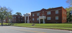 Richmond apartment for rent - a large brick building on the side of a street