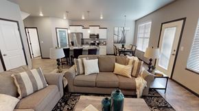 Mandan townhouse for rent - a living room with a couch and a table