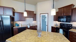 West Fargo townhouse for rent - kitchen, island, cabinets, pantry