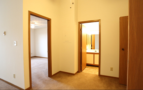 Zanesville apartment for rent - Image of a carpeted master bedroom and bathroom