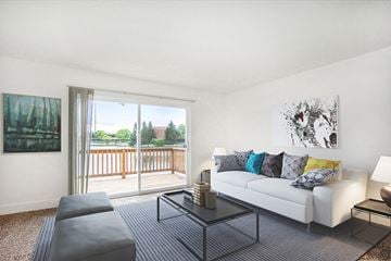 Grand Rapids apartment for rent - a living room with a couch and a coffee table