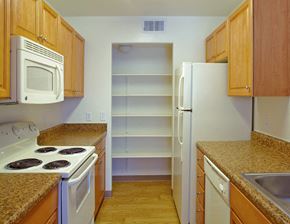 Nogales apartment for rent - a kitchen with white appliances and granite counter tops