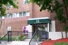 North York apartment for rent - A building with a green awning and the number 11 on it.