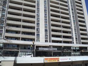 Toronto apartment for rent - an apartment building with a construction sign in front of it