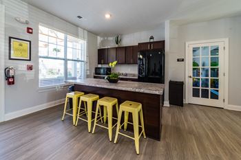 Kitchen with a bar stool