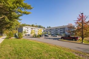 South Burlington apartment for rent - a view of an apartment building with a street in front of it