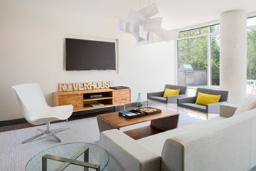 Winooski apartment for rent - a living room with a couch and a table and a television