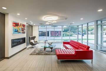 Winooski apartment for rent - a living room with red couches and a coffee table