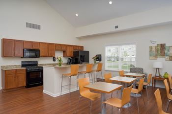 Clubhouse with lounge area and fitness center