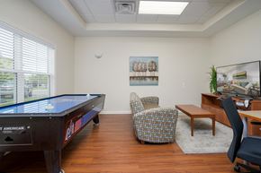Williamsville apartment for rent - a game room with a pool table and a desk