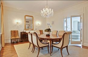 Chicago apartment for rent - A dining room with a large table and chairs.