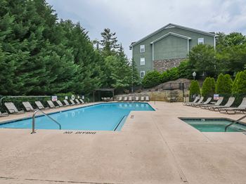 Swimming pool with hot tub