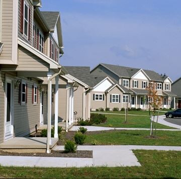 Scottsville townhouse for rent - A row of houses with a clear blue sky above them.