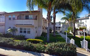 Laguna Beach triplex for rent - the neighborhood is full of houses with palm trees