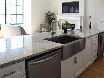 Granite countertops with farmhouse sinks