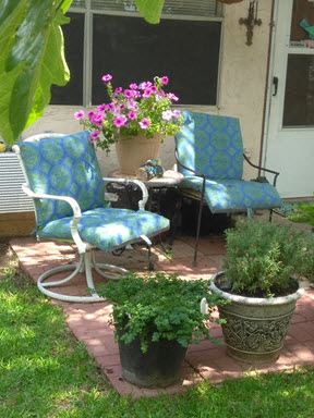 Ft. Worth apartment for rent - a patio with chairs and potted plants on a patio