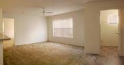 Orlando apartment for rent - Living Room and Laundry Room at Oak Glen Apartments, Orlando, Florida