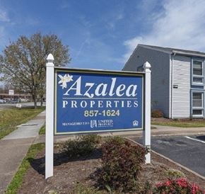 Norfolk apartment for rent - aadata properties sign in front of an apartment building