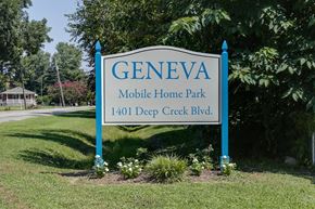Chesapeake apartment for rent - A sign for Geneva Mobile Home Park is displayed in front of a green lawn.
