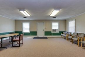 Chesapeake apartment for rent - A room with a table and chairs.