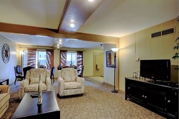 Prairie Village apartment for rent - a living room with furniture and a television