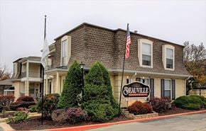 Prairie Village apartment for rent - Exterior image of building with sign and flags