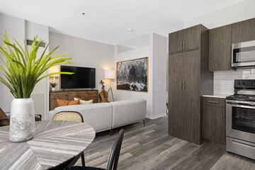 Chicago apartment for rent - a living room with a couch and a table