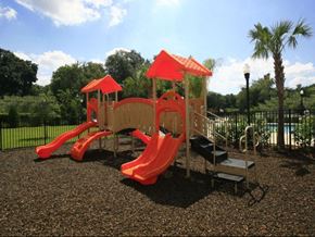 Bartow apartment for rent - Playground with slides at Summerlin Oaks Apartments