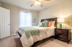 Biloxi apartment for rent - the reserve at city center spacious bedroom with ceiling fan