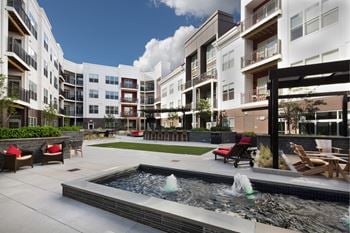 Outdoor courtyard lounge & 12’ outdoor cinema