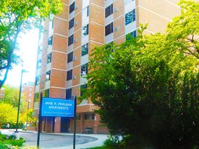 Evanston apartment for rent - a building with a blue sign in front of it