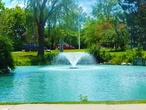 Wheeling apartment for rent - a fountain in the middle of a pond