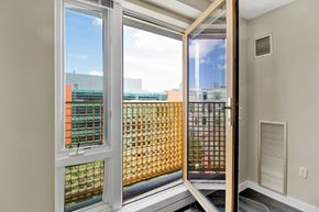 Cambridge apartment for rent - Close up of open living room window with city skyline views